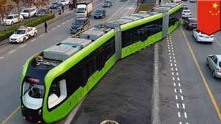 Future transport China launches futuristic trackless smart train  TomoNews [upl. by Elad]