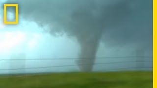 Tornadoes Lightning in Rare Video  National Geographic [upl. by Oinota]